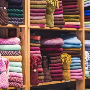 Store tissue. Big shelf with a colorful towels